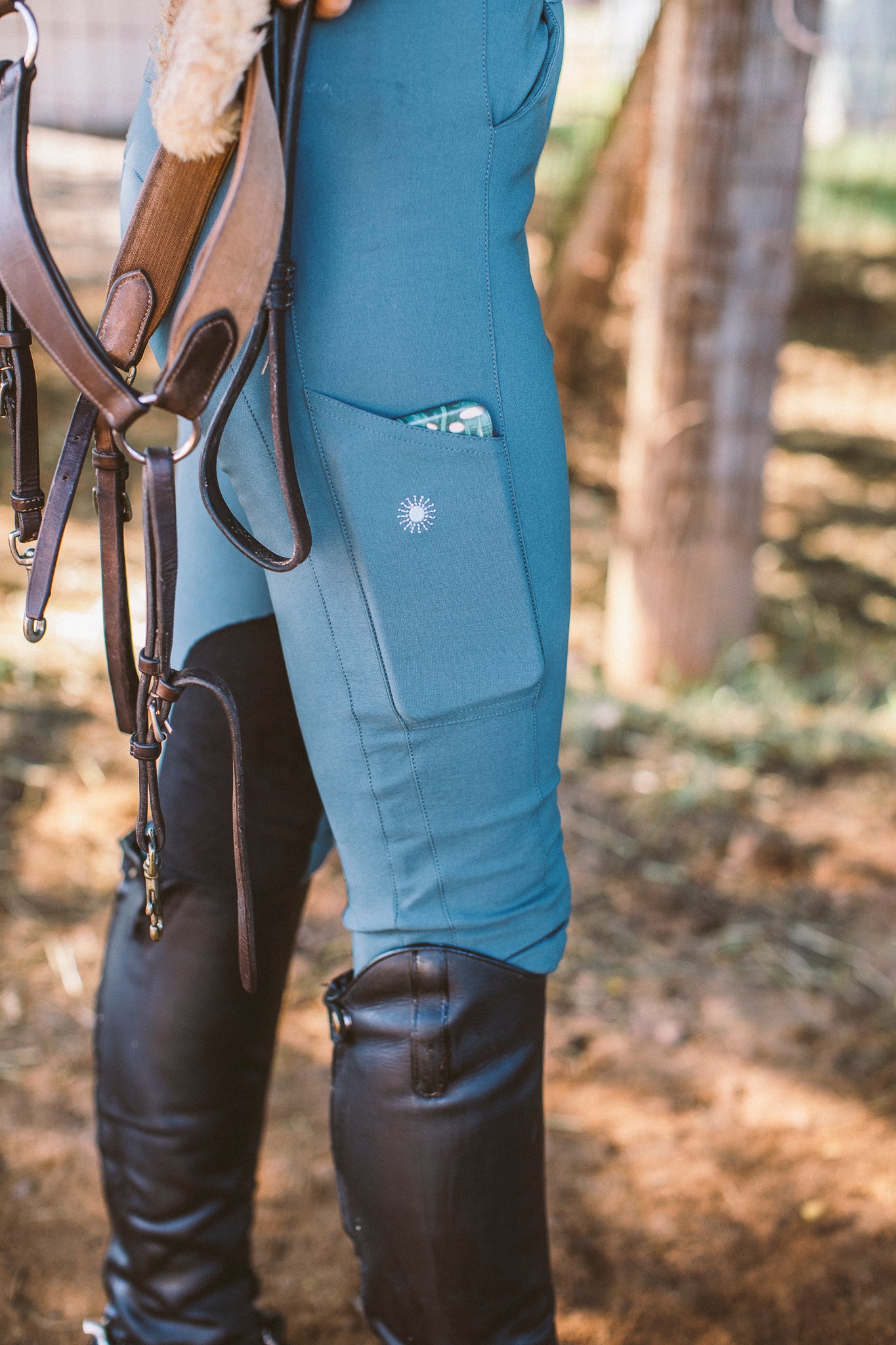 breeches feature a thigh pocket for phone